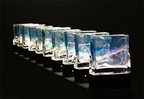 Ice cube Splats, 2005.  Poly-resin, acrylic, neon, 10’x 2’ x1’5